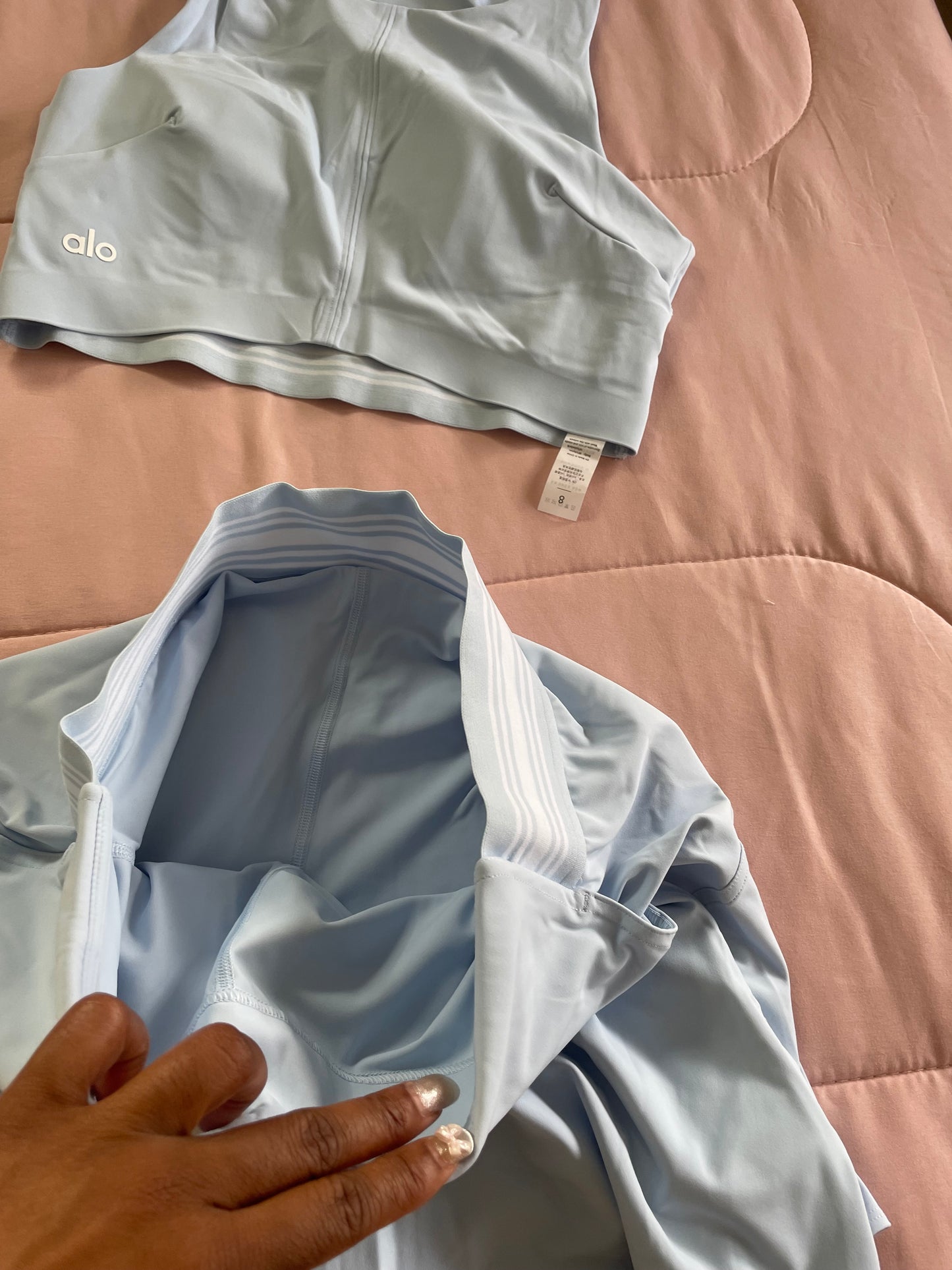 Blue grand slam tennis Alo sports top and skirt