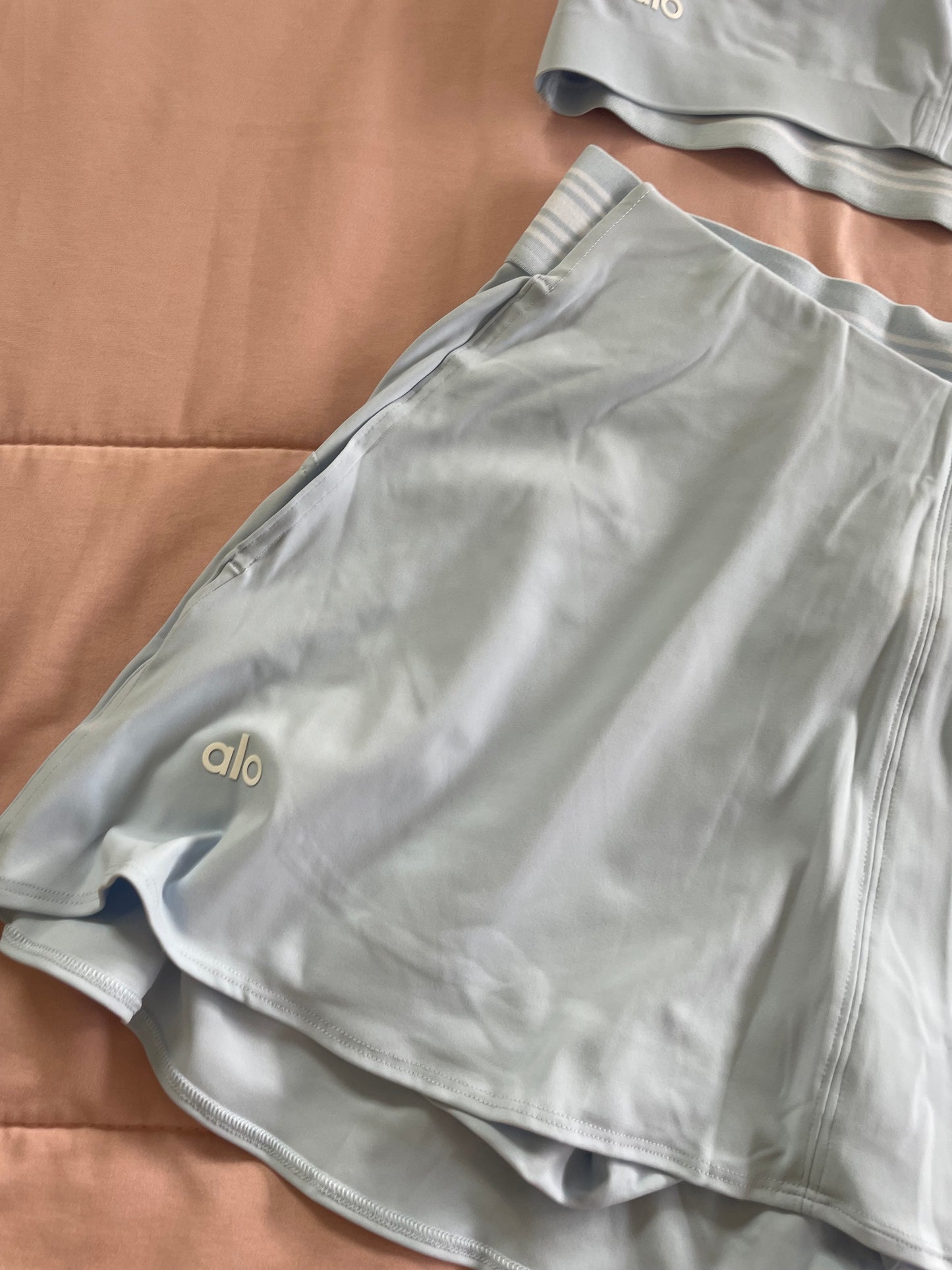 Blue grand slam tennis Alo sports top and skirt